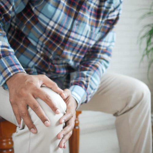 man suffering knee joint pain